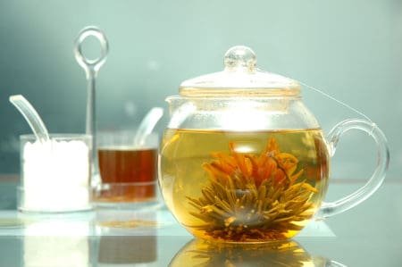 Flowering tea in a glass teapot